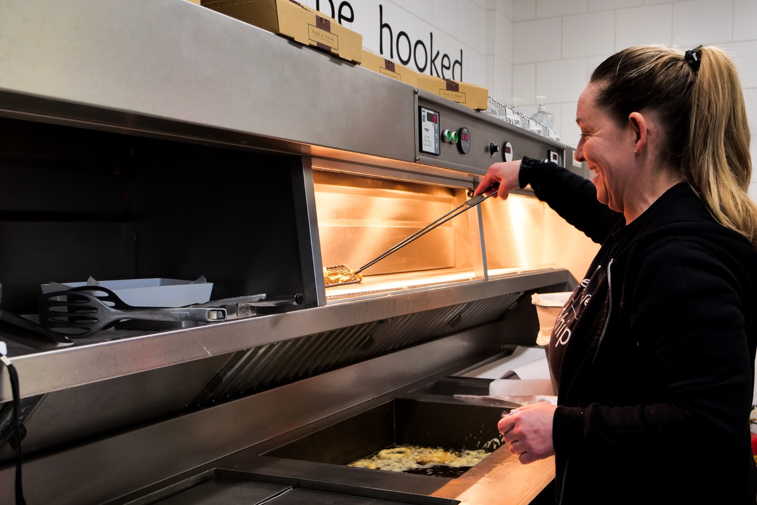 Cooking traditional fish and chips at Pier Vista